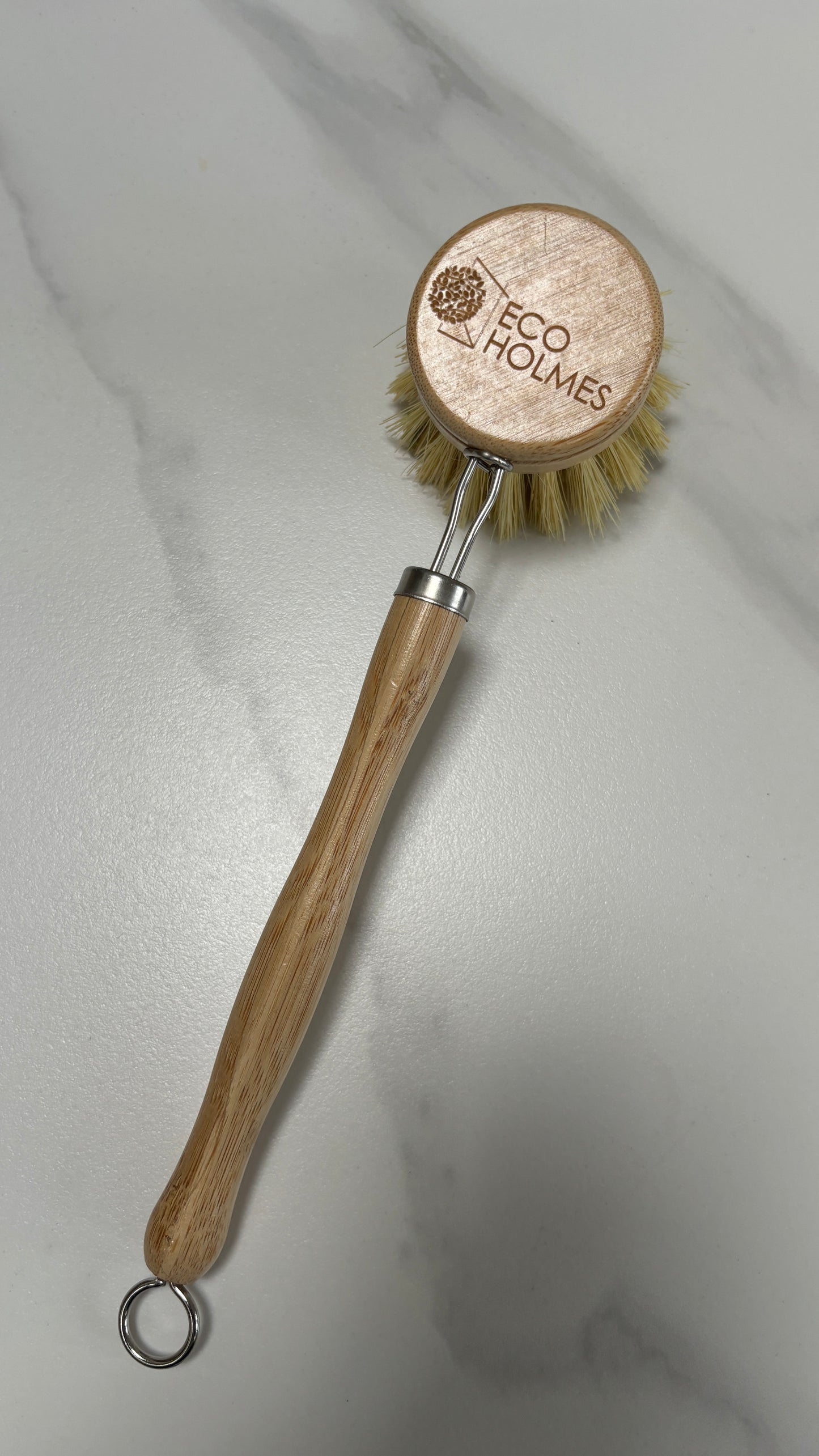 Durable bamboo dish brush designed for effective scrubbing without scratching dishes