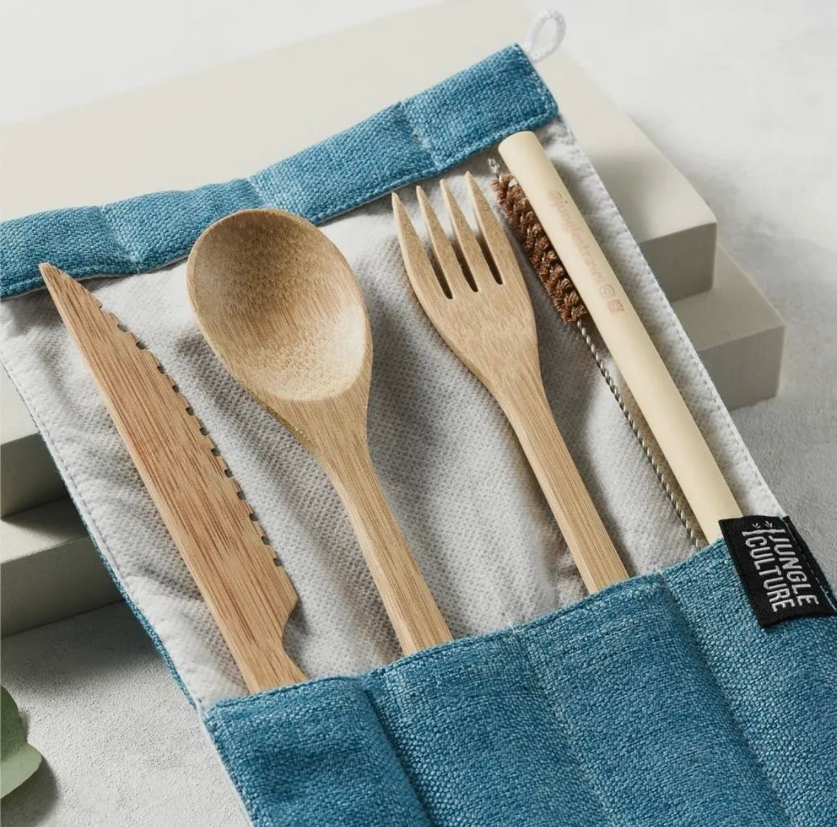 Reusable bamboo cutlery set with eco-friendly jute case for sustainable dining