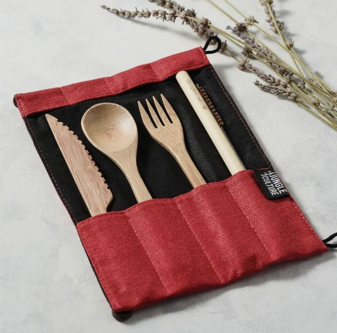 Zero waste bamboo flatware set with hand-carved fork, spoon, knife, and straw