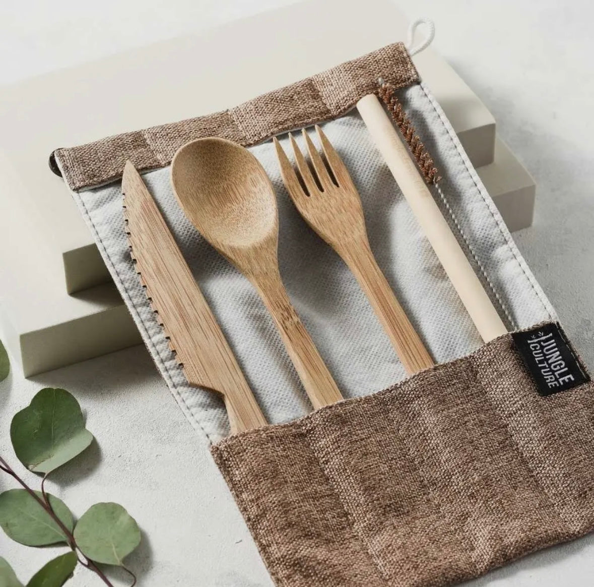 Ethically sourced bamboo travel cutlery set with jute carry case for zero-waste dining