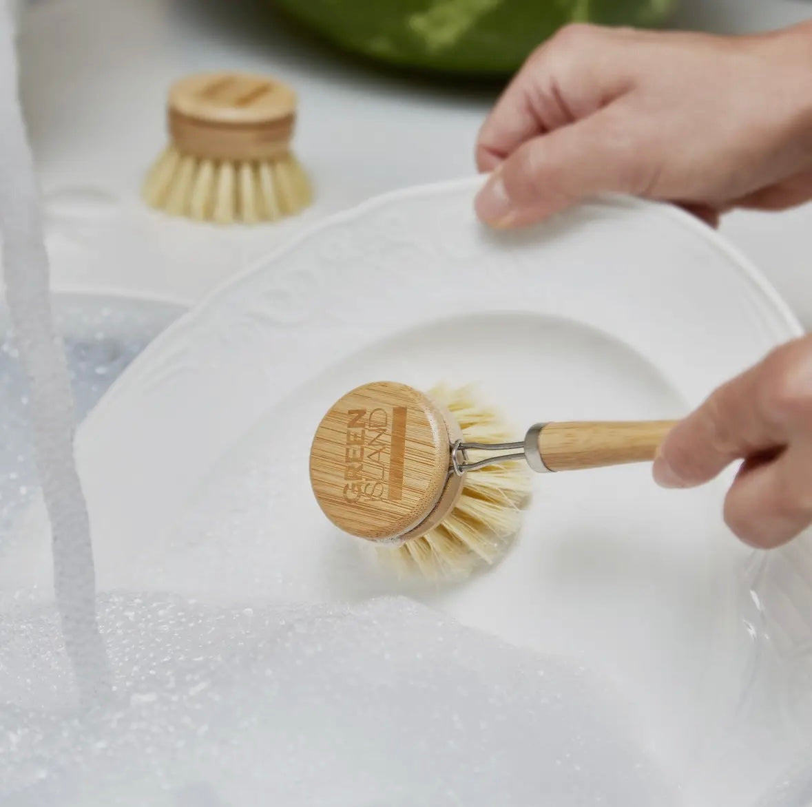 Ergonomically designed bamboo dish brush for easy handling and efficient cleaning